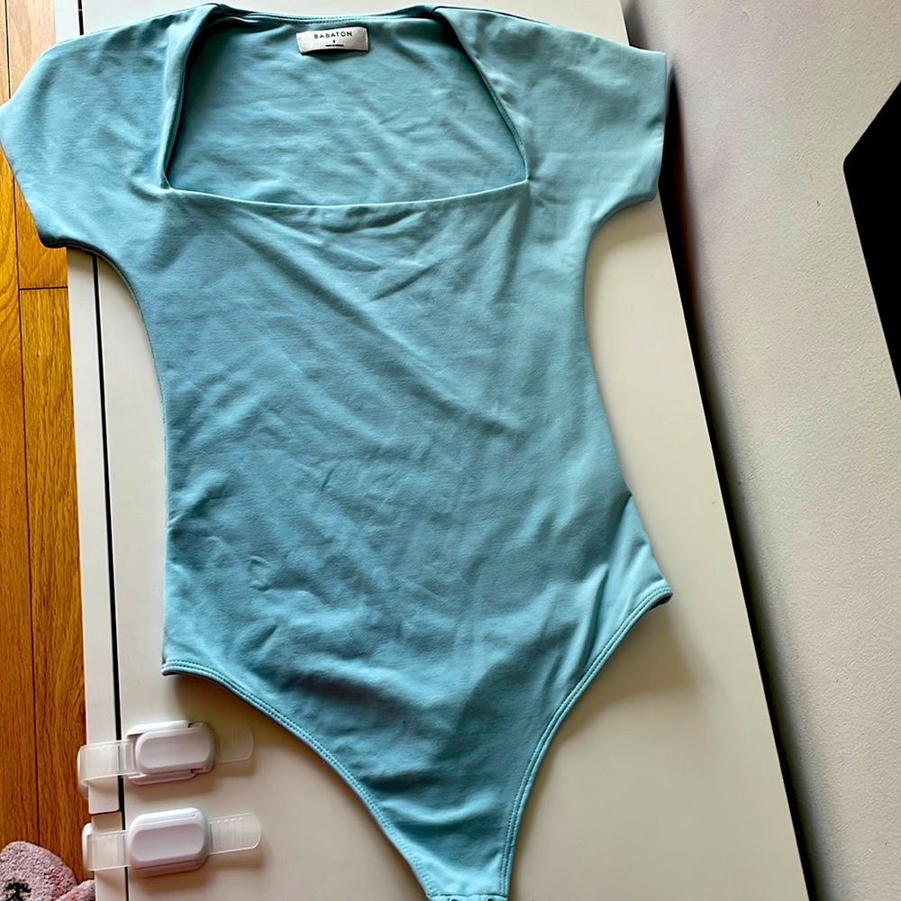 Aritzia “Babaton contour square neck bodysuit” light blue